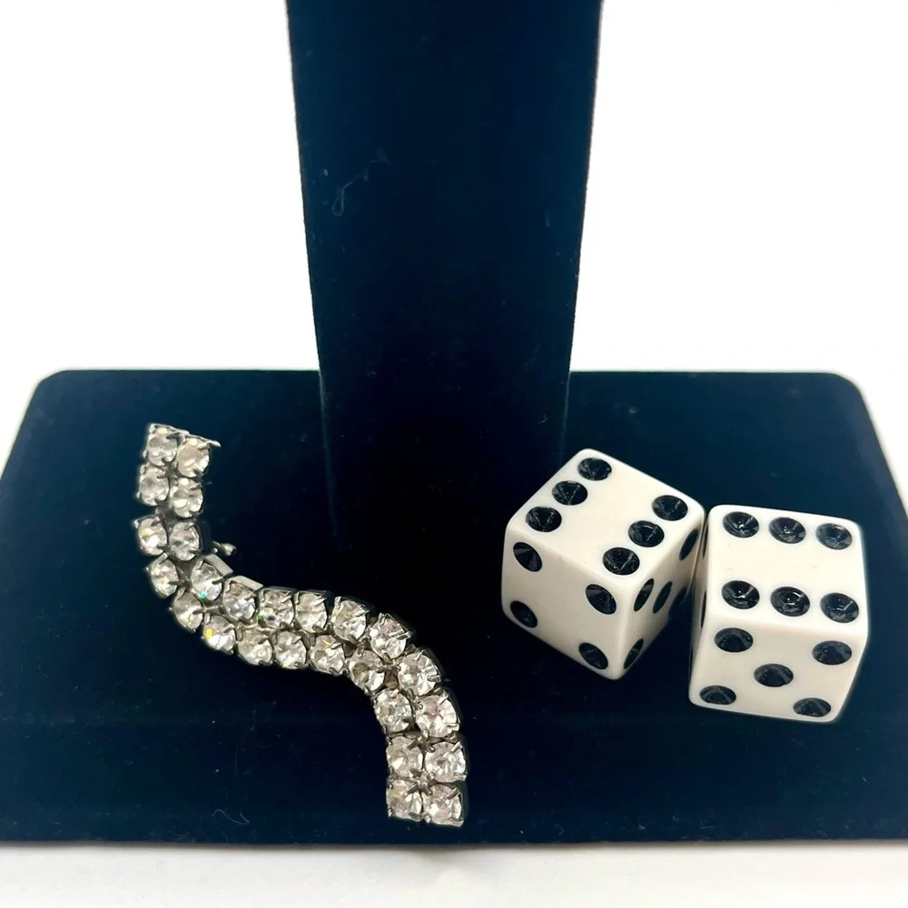 Vintage rhinestone wave brooch silver tone mid century